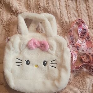 Hello Kitty Handbag with adjustable shoulder strap. White with pink bow. NWOT